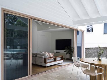 The house offers seamless connections between the interior and exterior spaces