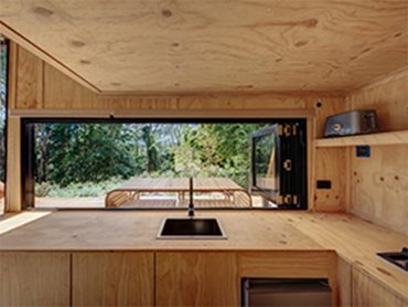 Cabin interior with timber ecoply panels