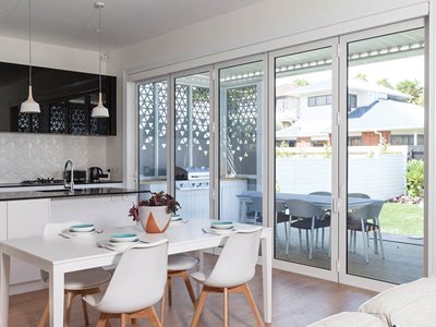 Modern living room interior with insulated glass patio doors