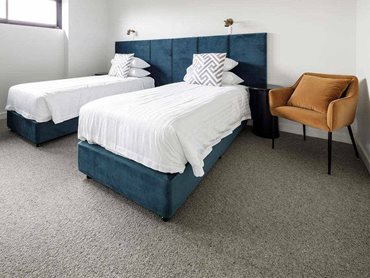 For the guest bedrooms, Feltex Spinifex, a 100% flecked wool broadloom carpet was chosen for its underfoot softness and durability