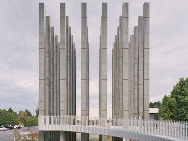 LESS features 36 concrete columns with a circular ramp leading up to a viewing platform