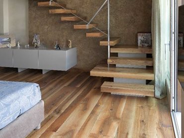 Open tread staircase achieved with Cadorin Italian timber