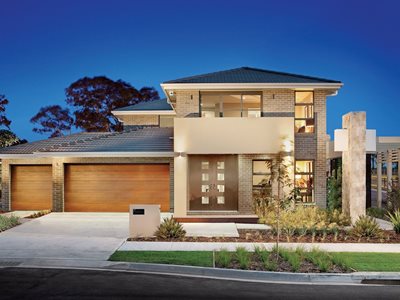 Exterior view of modern residential home with concrete roof tiles 