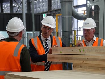 SA Premier Peter Malinauskas & Member for Mount Gambier Troy Bell observe Cross Laminated Timber in the NeXTimber facility