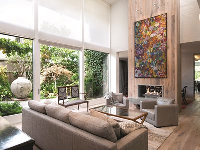 Modern Residential Living Room Interior with Wooden Panel Fireplace