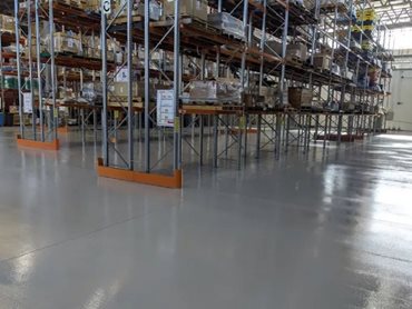 A high traffic, shared zone area between heavy forklifts and personnel demands a high performance, easy to clean, safe, non-slip floor.