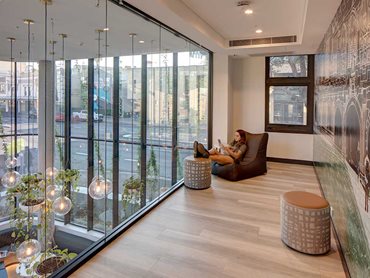 Signature vinyl planks create the perfect breakout space