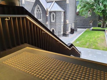 Classic Tredfx Solid Brass stair nosings complemented with Classic Solid Brass tactile indicators