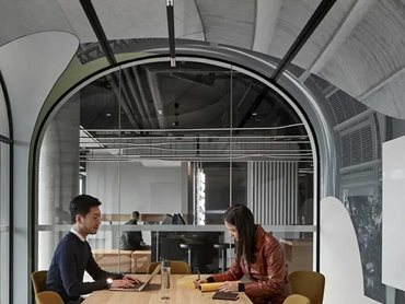 The bespoke graphics were printed onto Autex Acoustics’ 6mm Cube panels, which were bent to create a striking arched ceiling