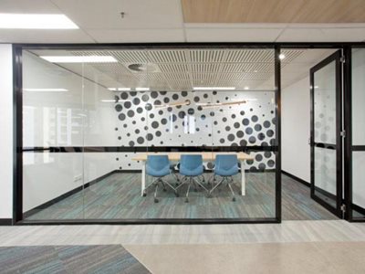 Bris Aluminium shopfront open meeting room spaces with black metal frames