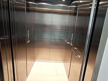 The Vertical Transportation (X-10) elevator features a stainless steel finish as well as compliant buttons and handrail