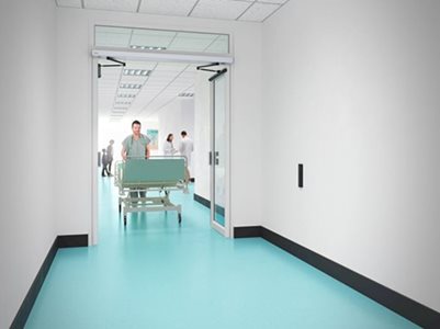 Interior Of Hospital Corridor With Swing Door System