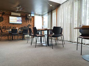 The York Street broadloom carpet has an exceptionally soft underfoot feel for customers and busy wait staff