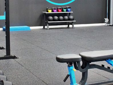 rubber gym flooring blue accents bench