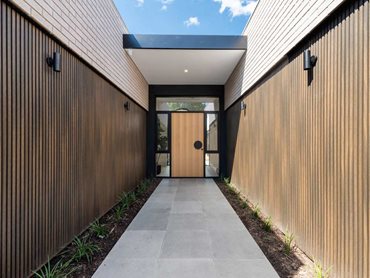 NewTechWood’s timber-look castellation cladding is a real standout on the property