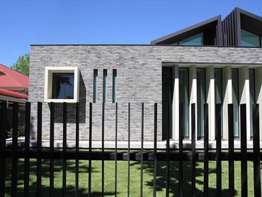 The ambient sensory delight of Petersen D91 bricks gives the home a spacial identity