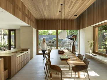Reclaimed Tasmanian Oak was chosen for the dining room as a ceiling lining to create a room encapsulated by the warmth of timber