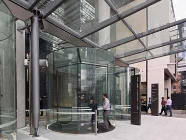 Diamond glass roof revolving doors have a bold and imposing presence 
