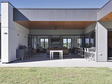 Barestone was used for both the interior and exterior walls of the stud farm home