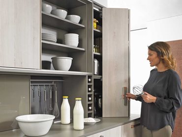 WingLine L cuts a fine figure in the top mounted kitchen unit and opens storage space for provisions and kitchen appliances Photo: Hettich