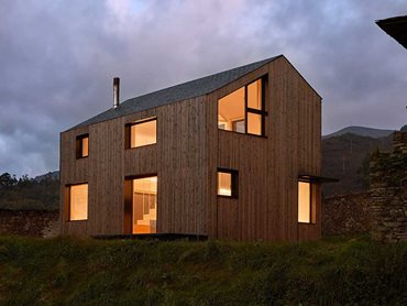 The Lunawood facade allowed the new home to naturally blend into the rural environment