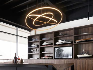 Olympic Three Ring bronze pendant was used as a feature light over the main seating area