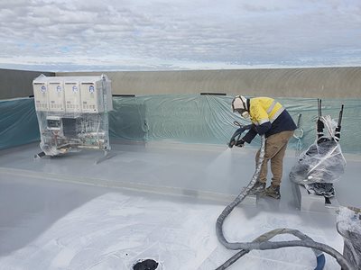 Rhino Linings Durable Waterproofing SolutionsSpraying Rooftop
