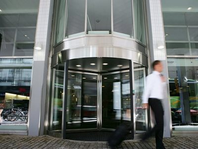 Assa Abloy RD3 Close Up Of Building Exterior With Revolving Doors