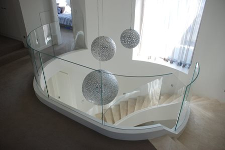residential staircase curved glass banister