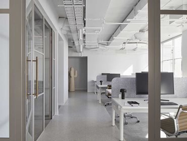 The interiors of the open plan office are designed to allow natural light to filter throughout 