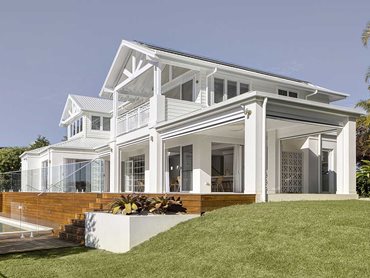 Linea Weatherboard has helped transform an ordinary brick home into an extraordinary waterfront property 