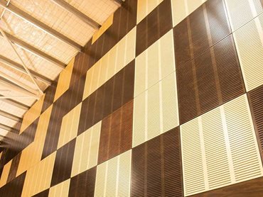 Featuring slotted Key-Ply panels in Aria Natural, Ebony and Spotted Gum finishes