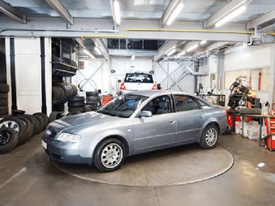 Silver Audi Car on Ralla Turntable Garage Interior