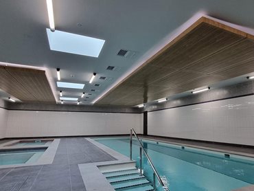 The ceilings in the pool/spa area were designed to feature a linear timber finish
