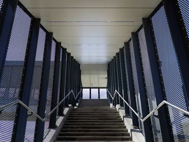 The intricate perforation pattern for the bridge, canopies, and stairs was carefully designed
