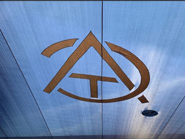 The custom 4m x 4m ATC logo affixed to the top-side of the new 350m² HDPE shade canopy
