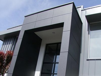 Building exterior with performance coating