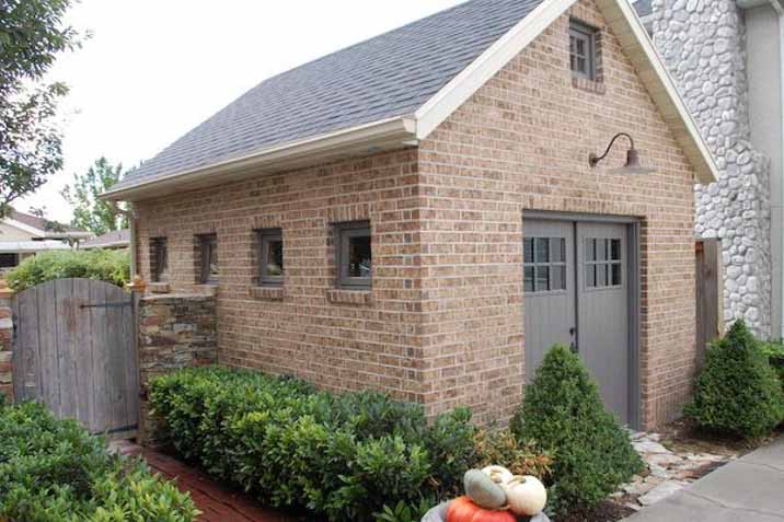 cute brick shed outdoors washed grey rustic