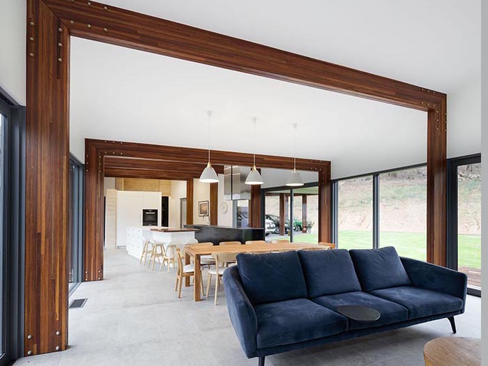 Glenrowan House with sustainable timber beams in living room interior