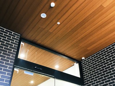 Innowood Soffit and Ceiling Entrance Black Tiled Walls