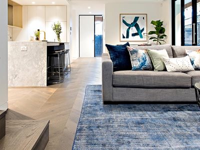 Plank Floors Chevron parquetry flooring in modern residential interior
