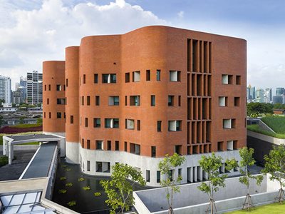 embassy building curved bricks