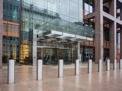 Commercial building entrance with shallow mount fixed bollards