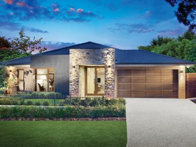 Night time external view of modern house with grey concrete roof tiles