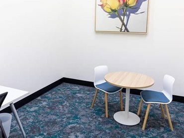 The carpet tiles help create a warm, comfortable and quiet setting for the Hope Hub