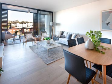 The lounge at a Pavilion Cronulla apartment featuring Havwoods timber floor