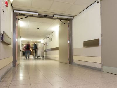 Interior Hospital Corridor With Swing Door System 