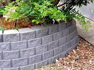 Detailed image of masonry blocks used for garden bed edging