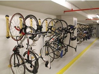 Vertical, wall and frame-mounted bicycle parking racks and hangers