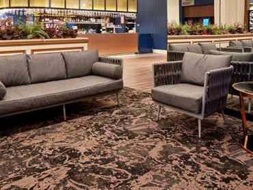 The carpet designs created a blended, layered appearance that lends itself to high traffic areas
